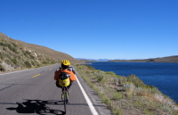 Zach rides north on the June Lake Loop past stark and treeless Grant Lake.  (7131ft)