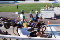 Receiving instructions on the final race for the day.