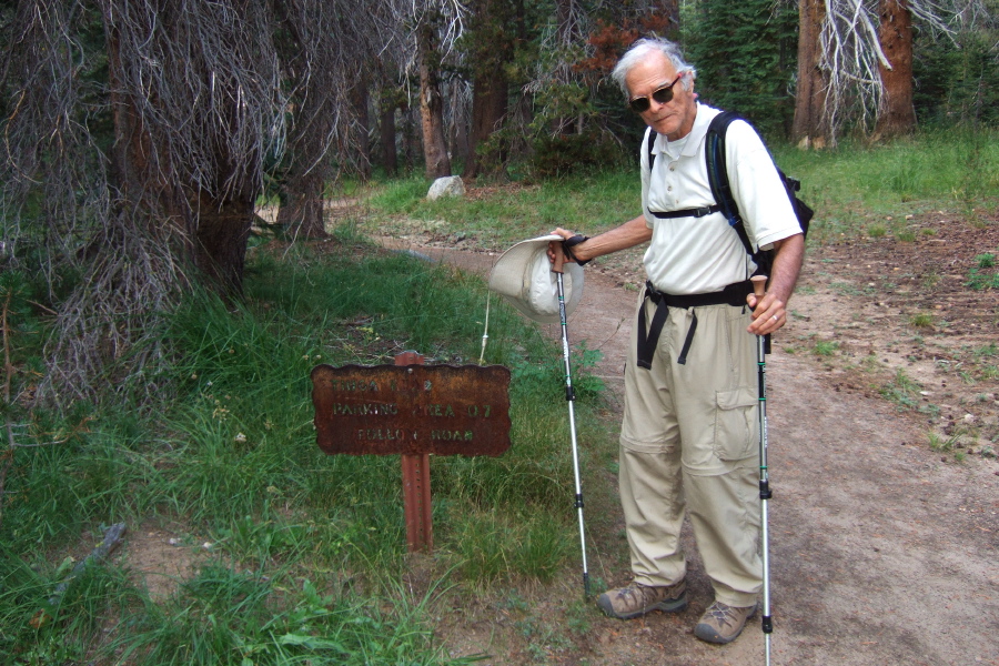 David at the sign showing we have 0.7 miles to go.