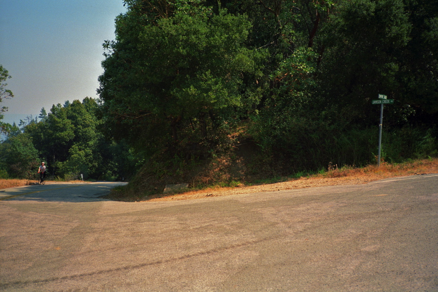 Chris reaches the top of Jamison Creek Rd.