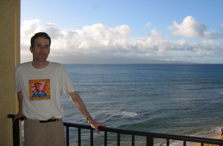 Bill on the balcony overlooking the Pailolo Channel and Molokai Island in the background.