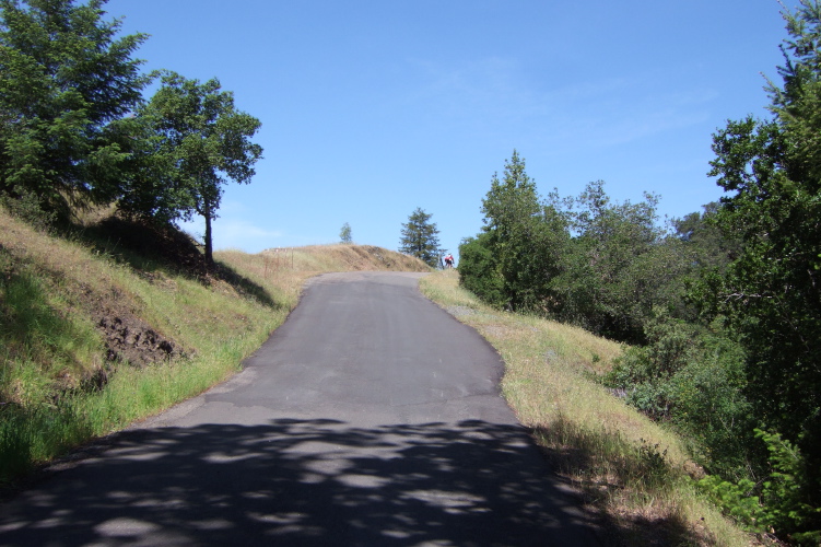 King Ridge Rd. attains the top of the first summit on King Ridge.