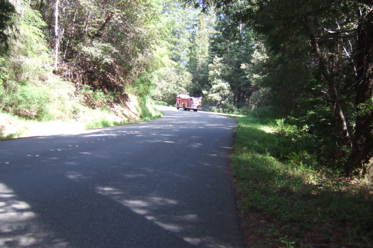 The fire truck is climbing the steepest section of Timber Cover Rd. (~18% grade).