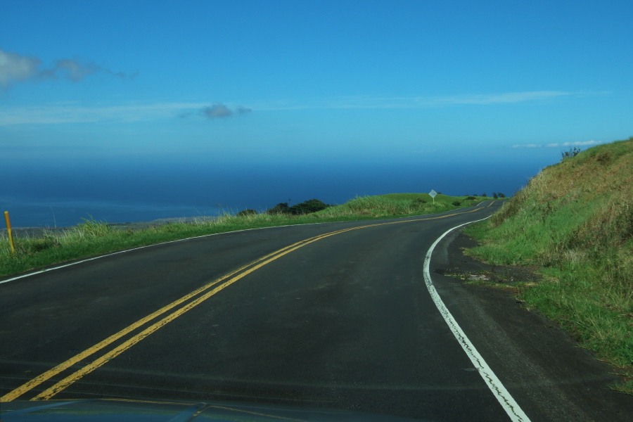 Kohala Mountain Road descends over grassy hills toward Hawi near the northernmost point of Hawai'i.