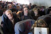David, Bill, and Kay on the flight home.