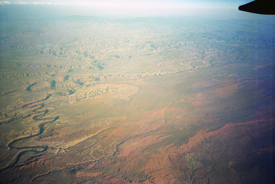 Flying over a meandering river.