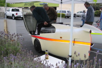 Craig Johnsen gets into his home-faired ICE velomobile.