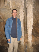 Bill in front of a couple columns in Lehman Cave.