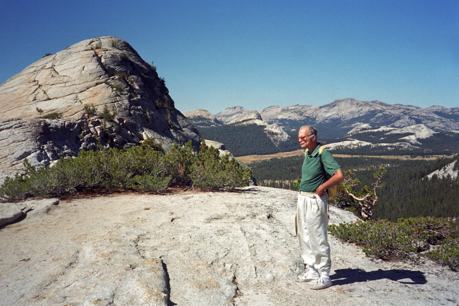 David stands crossly in front of Lembert Dome.