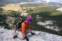 Zach Kaplan challenges his fear of heights at the edge of the west face of Lembert Dome (9330ft) 