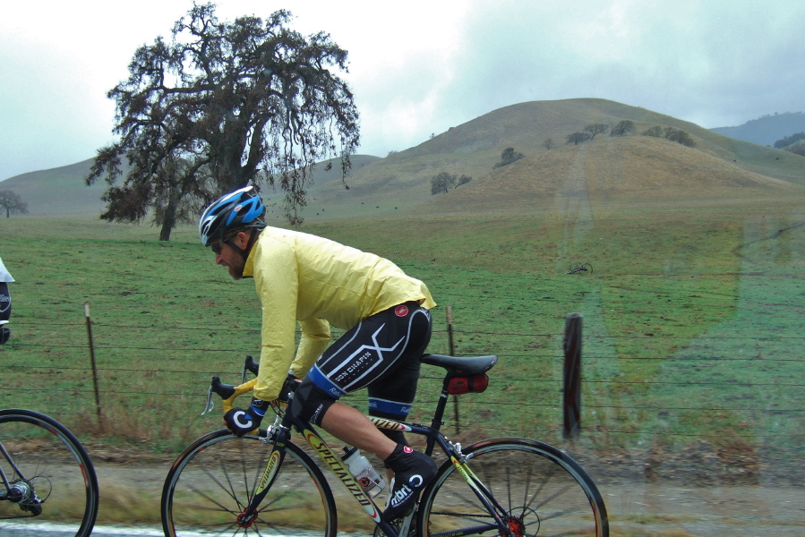 A rider on Team Don Chapin climbs up Bear Valley.