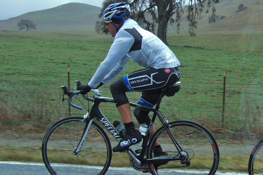 A rider on Team Don Chapin leads the group up Bear Valley.