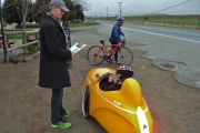 Kevin Winterfield inspects the velomobile.