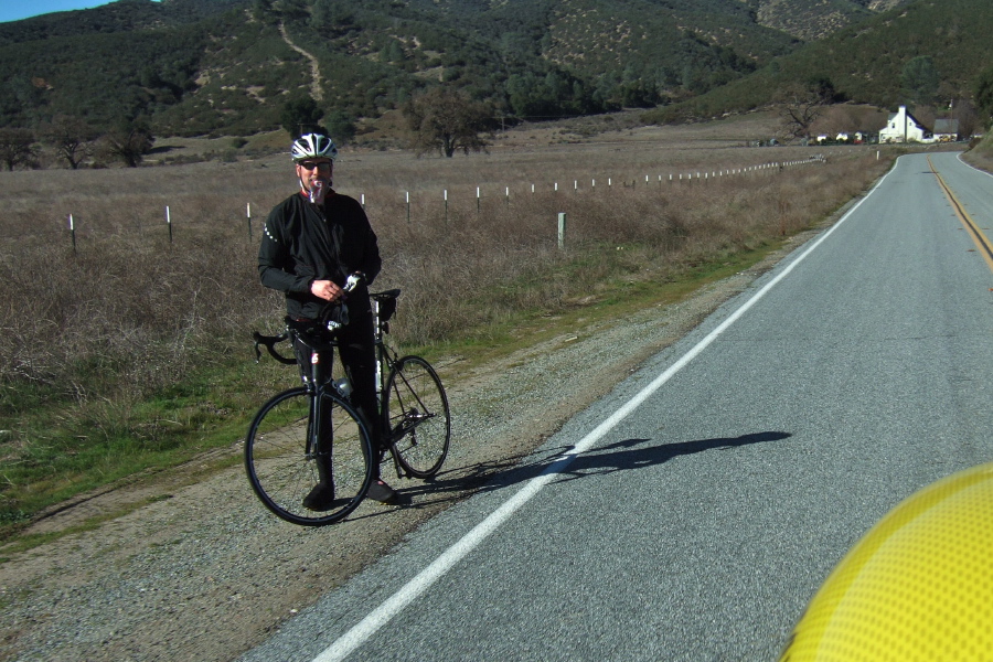 A rider stops near the low point in Bear Valley.