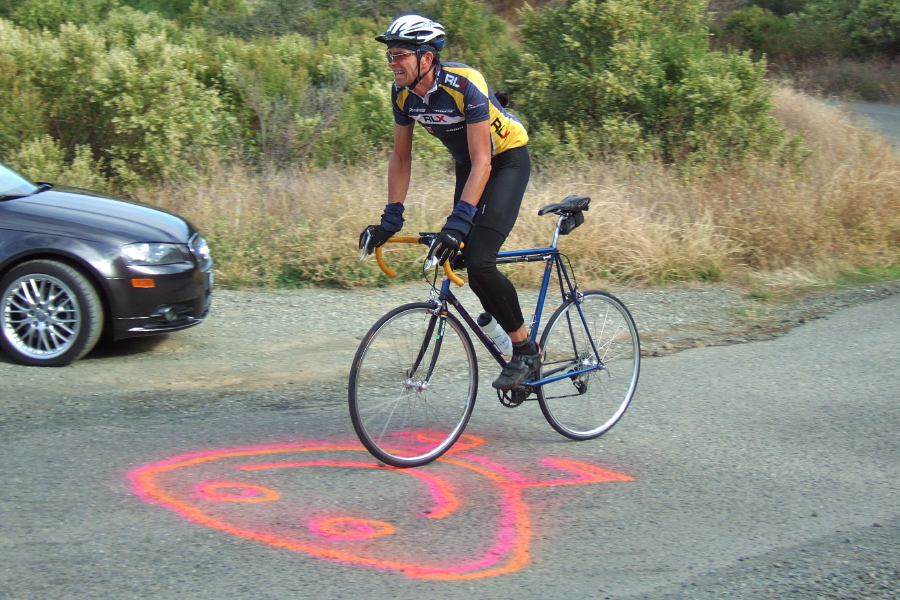 Bill Preucel gives a final out-of-saddle push.