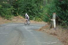 Jacob Berkman rounds one of the steep corners on Gates Canyon Rd.