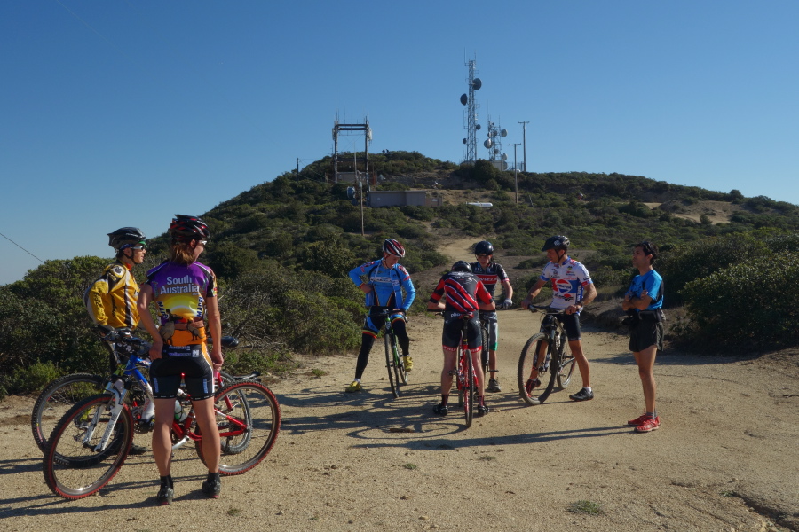 Riders rest just past the finish line.