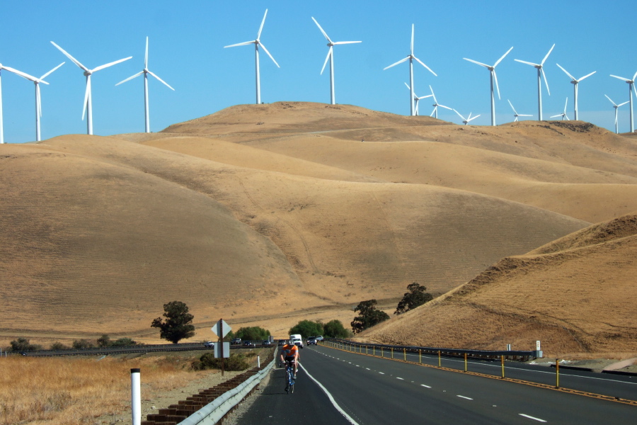 Gregory Smith and Barry Burr climb past the giant windmills.