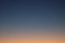The waxing crescent begins to appear.