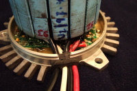 Detail showing new wires passed into the housing.