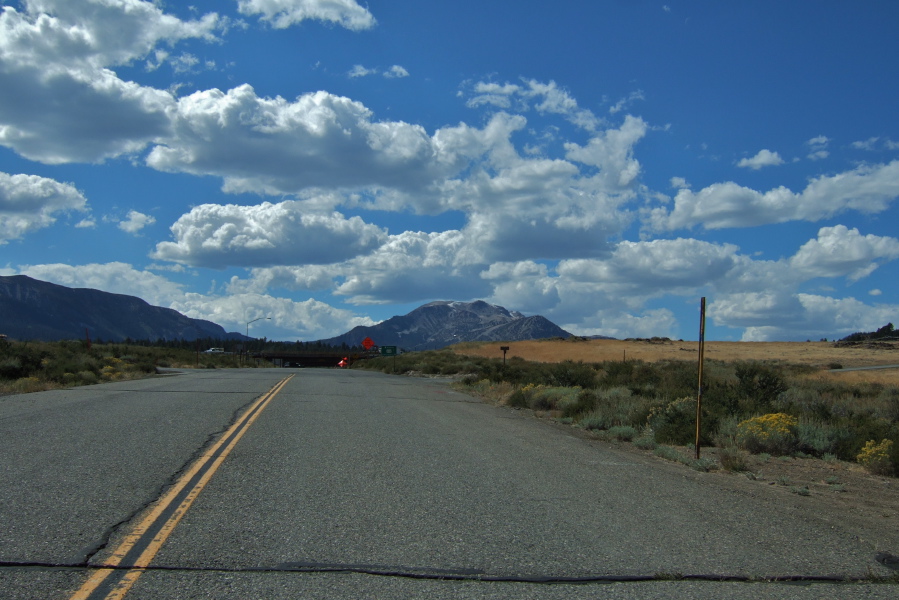 Interesting puffy clouds begin to develop over Mammoth Mountain.