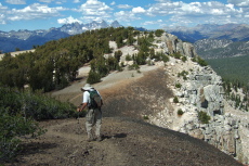 David starts down the use trail that follows the northern reach of Mammoth Crest.