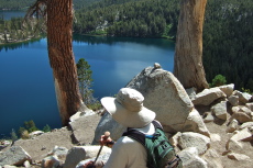 David admires the view of Lake George from the Mammoth Crest Trail.