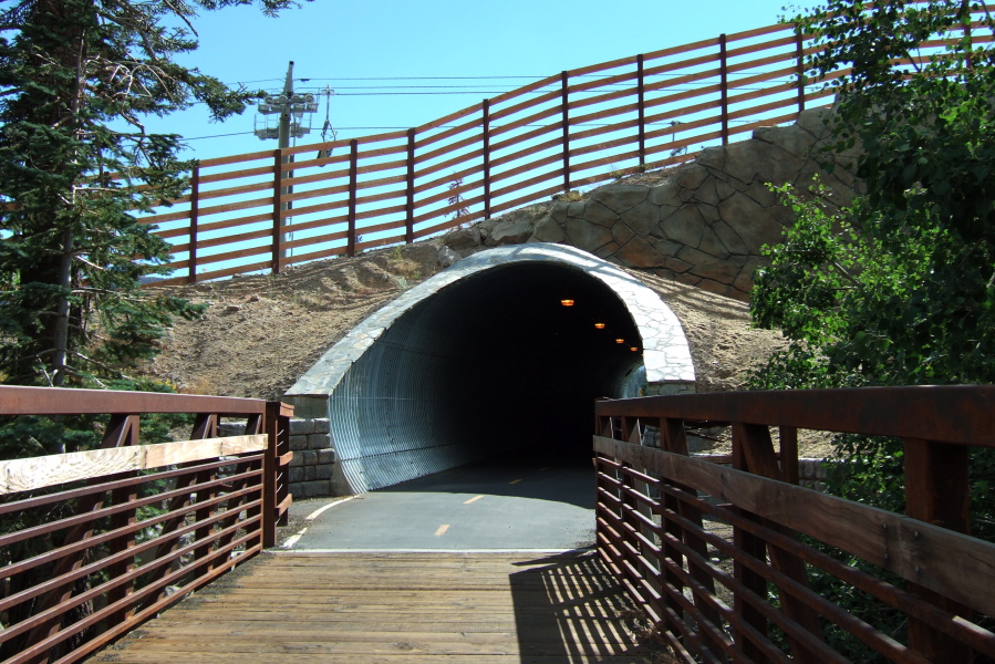 The bike path gets its own bridges and tunnels.