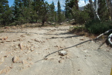 Descending carefully through the rocky section.