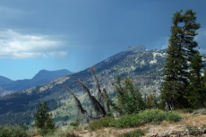 Rain is already falling atop San Joaquin Mountain and the Teats.