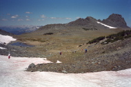 The group descends the west side of Deer Pass to the great plateau.