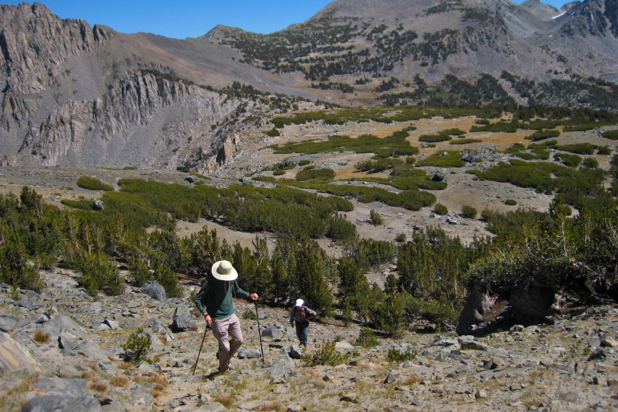 Bill and Stella climb up to Deer Pass.