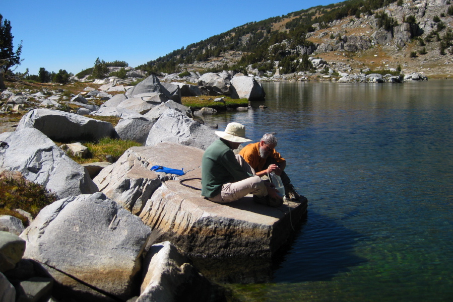 Frank and Bill pump water from the lake into our bladders.