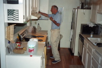 David prepares dinner in the kitchen