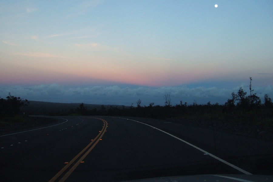 With sunset behind us the shadow of Mauna Kea and Mauna Loa can be seen against the clouds.