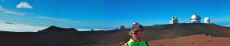 Laura enjoys the view from the summit of Pu'u Wekiu, the high point on Mauna Kea at 13796ft.