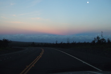 With sunset behind us the shadow of Mauna Kea and Mauna Loa can be seen against the clouds.
