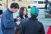 Ken Straub (left) and Lisa Antonino chat with Dan Connelly (back to camera)