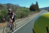 Russ Stevens keeps up the pace five miles from the finish to set the best time for the male single category.