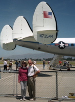 Kay and David stand behind a Constellation tri-tail.