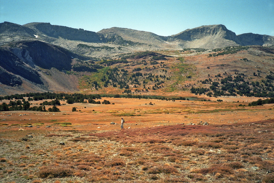 David in the meadow between Parker Pass and Spillway Lake in the distance