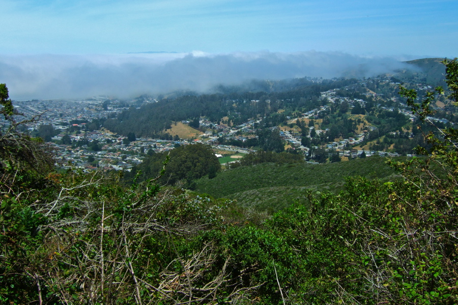 View of fog rolling over Pacifica from the highest bench