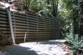 A bulging retaining wall on Gist Rd. (1780ft)