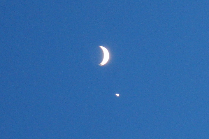Venus next to the new crescent moon.