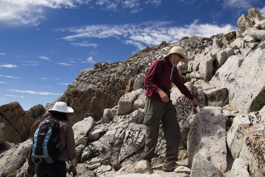 Bill delivers a blessing to the rock before we begin the technical climb up the arete.