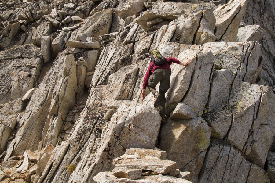 Bill pulls himself up one of the tougher spots.