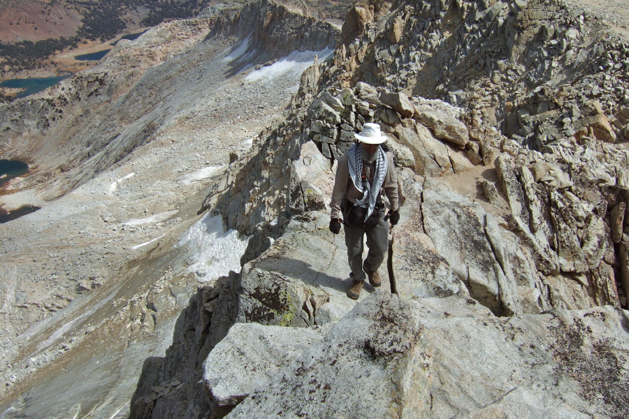 Frank strolls across the exposed rock.