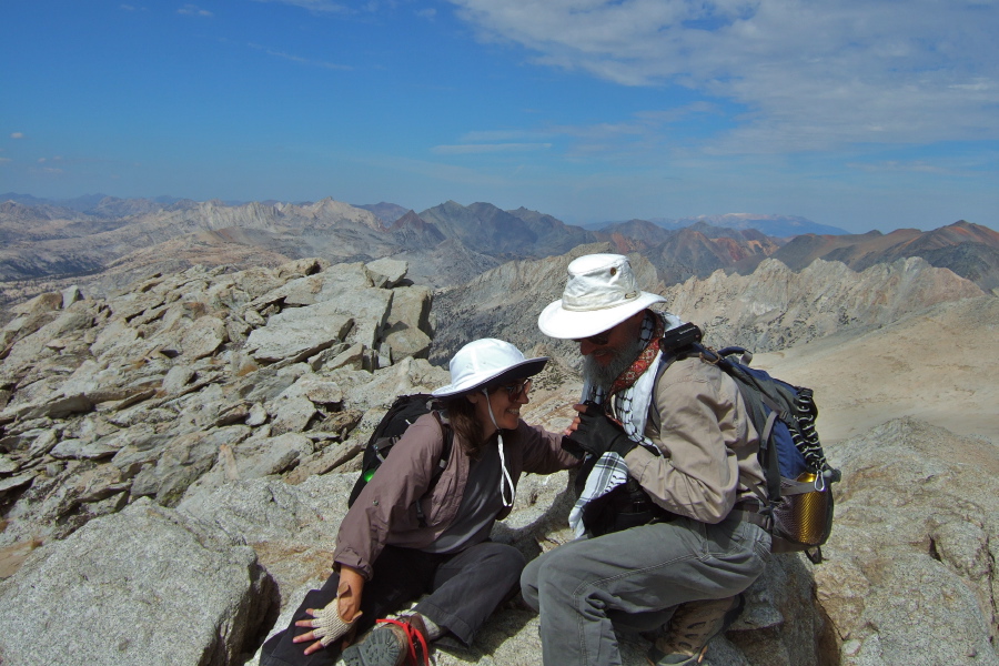 Stella and Frank congratulate each other for climbing to the summit.