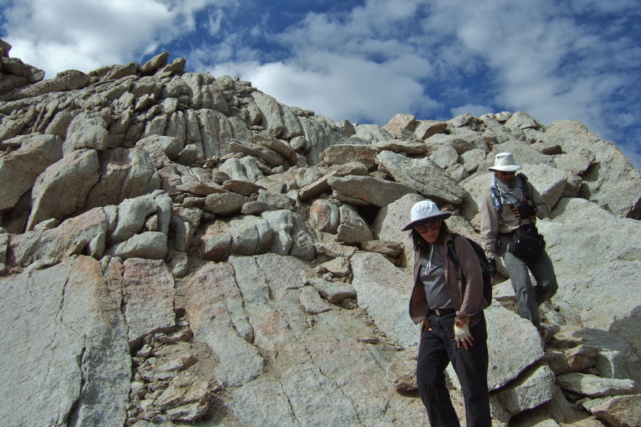 Stella and Frank consider each step carefully as they descend from the summit.