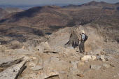 Bill photographs the start of the east ridge descent.